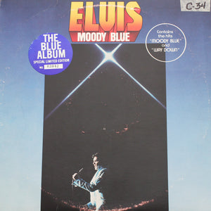 Elvis Presley <br>Moody Blue<br> 12" Blue Vinyl Clock